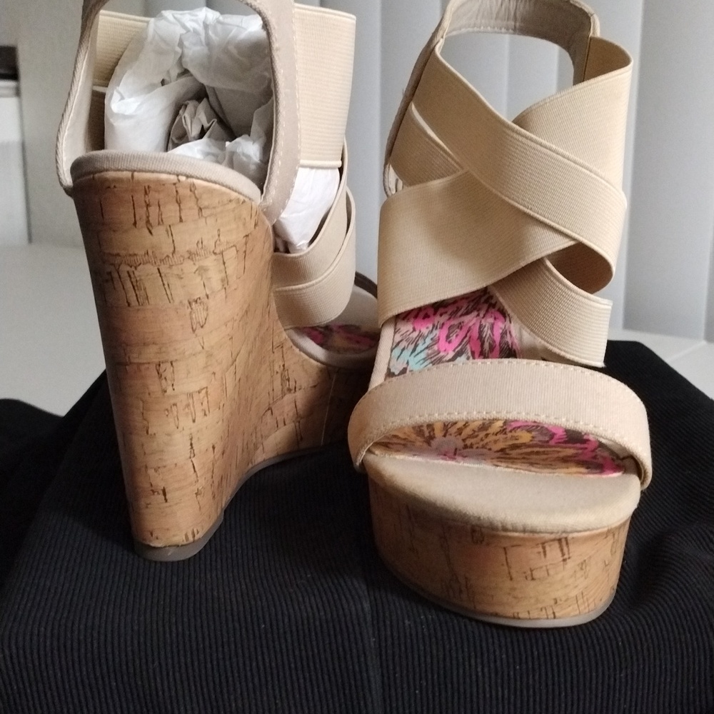 Woman wedge sandals by Madden girl size 7 with elastic straps open toe tan color